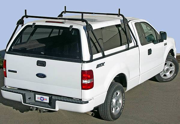 Cargo rack outlet for truck topper